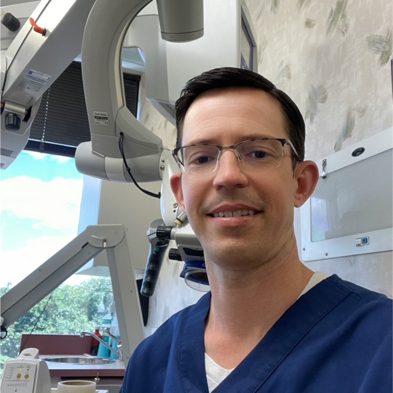 Headshots of Benjamin Adams Endodontist