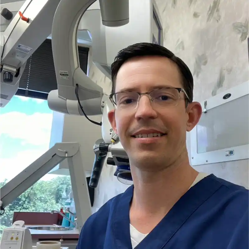 Headshots of Benjamin Adams Endodontist